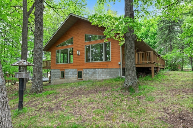 568 26th Ave, Cumberland, WI 54829 - view of home's exterior featuring a deck