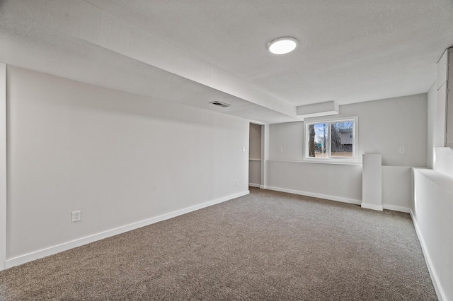 basement with carpet and baseboards