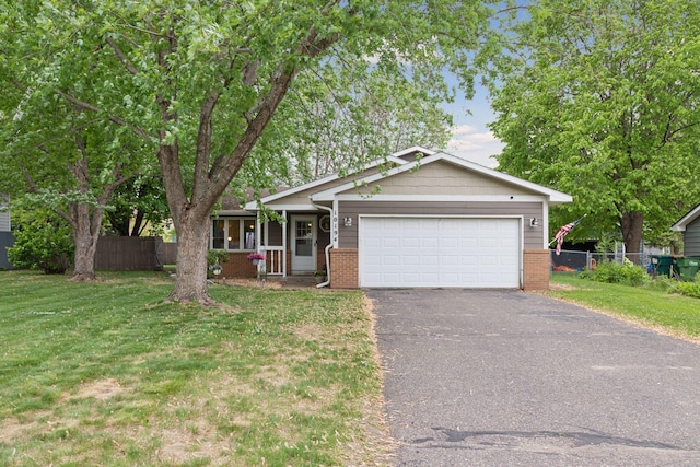 10194 Jewell St NE, Blaine, MN 55014 - single story home with driveway, an attached garage, and brick siding