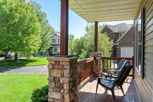 19883 Evensong Ct, Farmington, MN 55024 - wooden porch with a yard and a garage