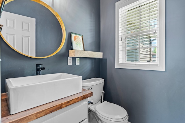 19883 Evensong Ct, Farmington, MN 55024 - bathroom with vanity, toilet, and baseboards