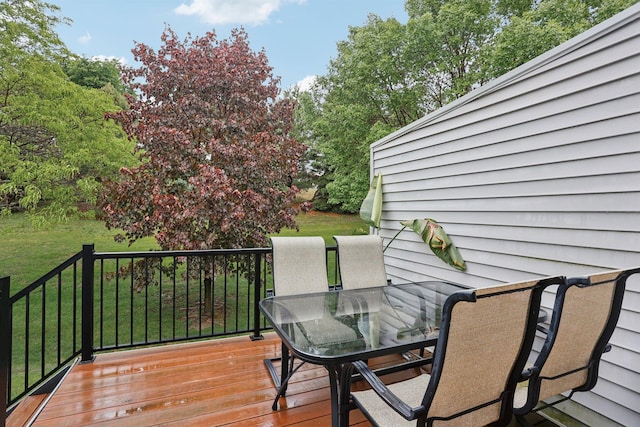 3394 Spring Glen Cir NW, Prior Lake, MN 55372 - deck with outdoor dining space and a lawn