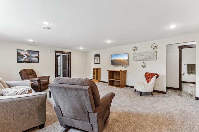 10798 Quiner Ave NW, Southside Twp, MN 55382 - living area with recessed lighting, carpet flooring, and baseboards
