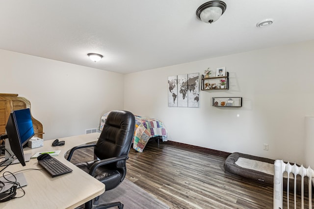 10798 Quiner Ave NW, Southside Twp, MN 55382 - office with radiator, wood finished floors, and baseboards