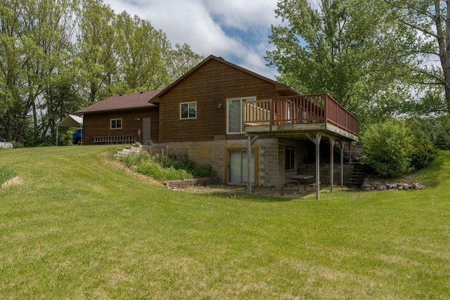 24058 610th Ave, Madison Lake, MN 56063 - back of house featuring a wooden deck and a lawn