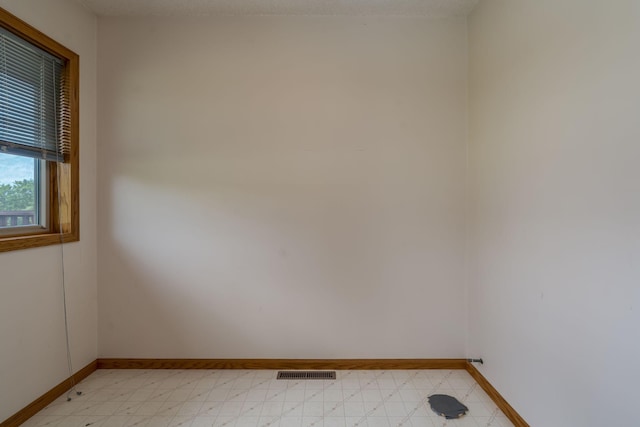 24058 610th Ave, Madison Lake, MN 56063 - unfurnished room featuring baseboards and light floors