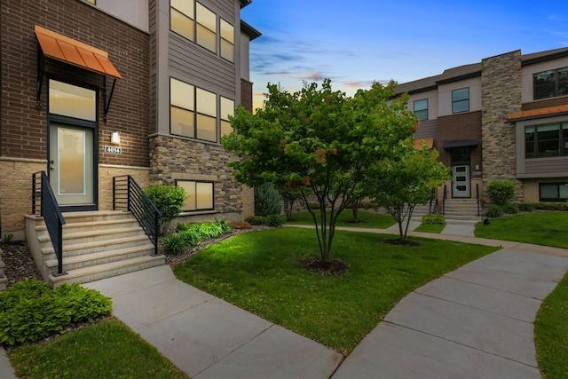 4014 River Valley Way, Eagan, MN 55122 - view of front facade with a front yard and stone siding