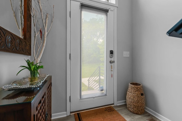 4014 River Valley Way, Eagan, MN 55122 - doorway with plenty of natural light and baseboards