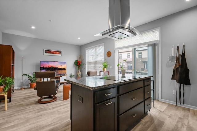 4014 River Valley Way, Eagan, MN 55122 - kitchen with black electric cooktop, light wood-type flooring, island exhaust hood, recessed lighting, and dark stone countertops