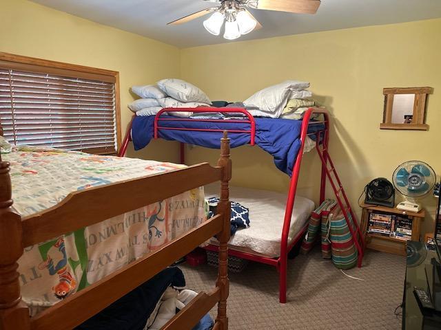 2377 Finn Bay Rd, Babbitt, MN 55706 - carpeted bedroom featuring ceiling fan
