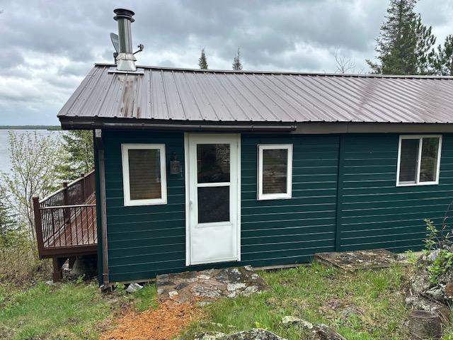 2377 Finn Bay Rd, Babbitt, MN 55706 - back of property with metal roof