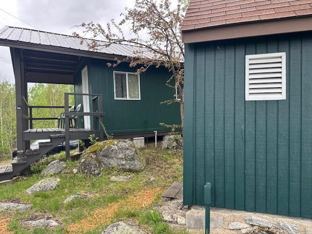 2377 Finn Bay Rd, Babbitt, MN 55706 - view of side of property with metal roof