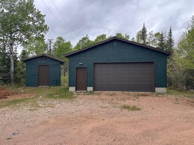 2377 Finn Bay Rd, Babbitt, MN 55706 - detached garage featuring a storage shed