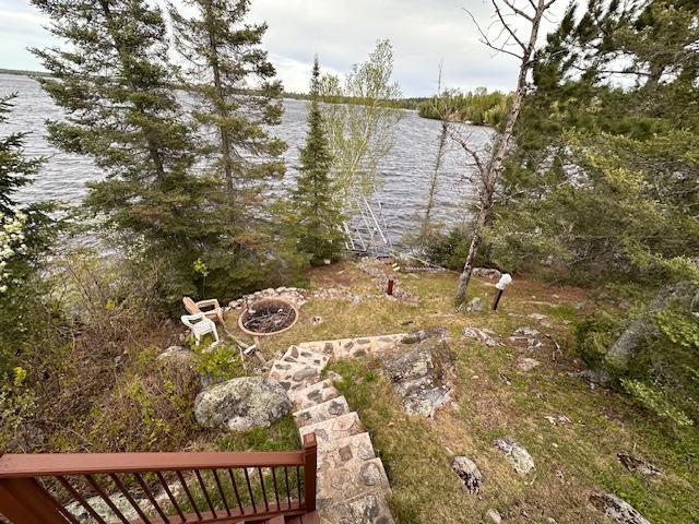 2377 Finn Bay Rd, Babbitt, MN 55706 - view of yard with a water view and an outdoor fire pit