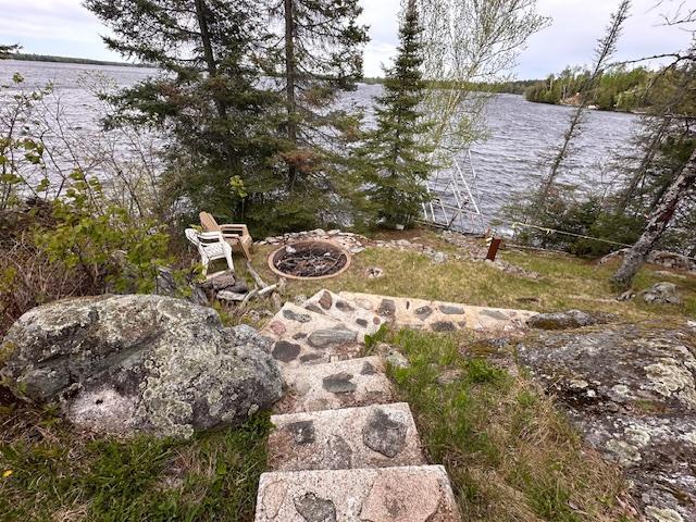 2377 Finn Bay Rd, Babbitt, MN 55706 - view of yard featuring a water view and an outdoor fire pit
