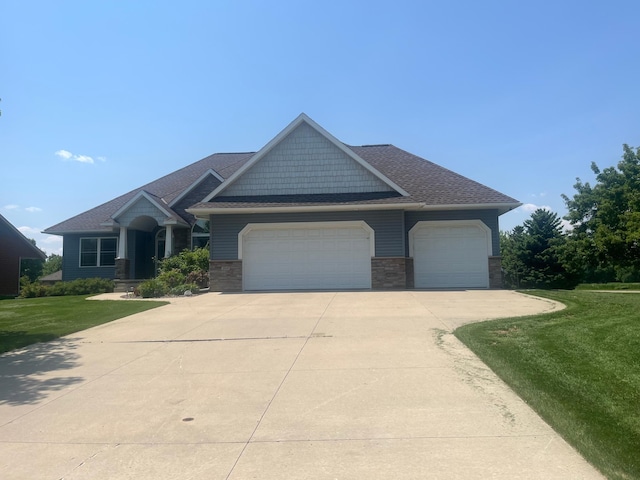 1808 4th St NE, Willmar, MN 56201 - craftsman-style home featuring a garage, a front lawn, and driveway