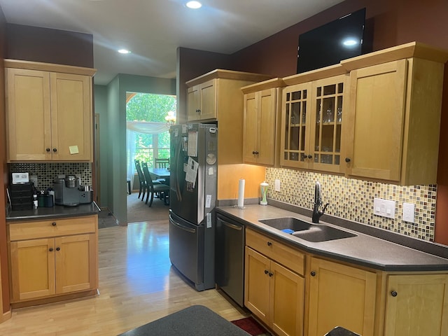 1808 4th St NE, Willmar, MN 56201 - kitchen featuring freestanding refrigerator, dishwasher, light brown cabinets, a sink, and recessed lighting