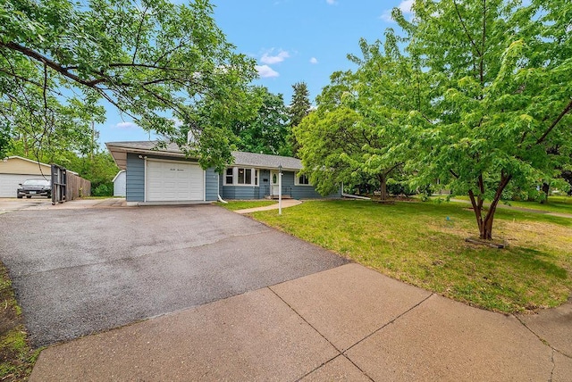 3013 64th Ave N, Brooklyn Center, MN 55429 - single story home featuring a front lawn, driveway, and an attached garage