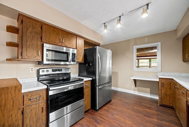 3013 64th Ave N, Brooklyn Center, MN 55429 - kitchen featuring appliances with stainless steel finishes, open shelves, brown cabinetry, dark wood-style flooring, and light countertops