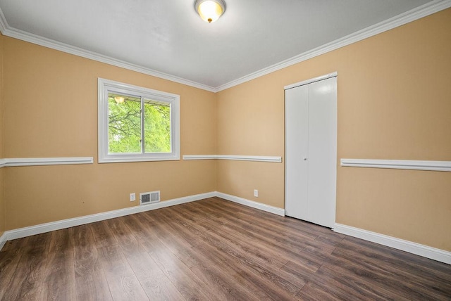 3013 64th Ave N, Brooklyn Center, MN 55429 - empty room with baseboards, wood finished floors, and ornamental molding