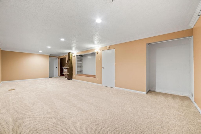 3013 64th Ave N, Brooklyn Center, MN 55429 - finished below grade area featuring baseboards, light colored carpet, recessed lighting, a textured ceiling, and ornamental molding