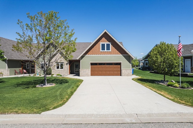 922 Lake Forest Cir, Detroit Lakes, MN 56501 - craftsman house with board and batten siding, a front yard, concrete driveway, and brick siding