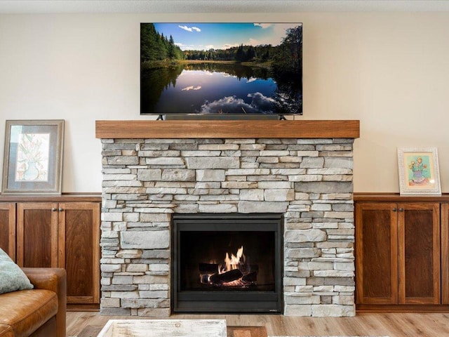 16524 Piper Ln, Brainerd, MN 56401 - detailed view of wood finished floors and a stone fireplace