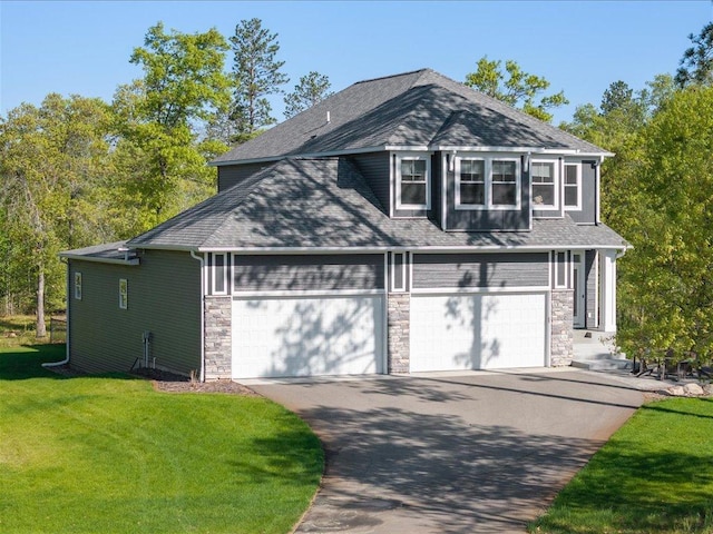 16524 Piper Ln, Brainerd, MN 56401 - view of front of home with stone siding, driveway, a front lawn, an attached garage, and roof with shingles