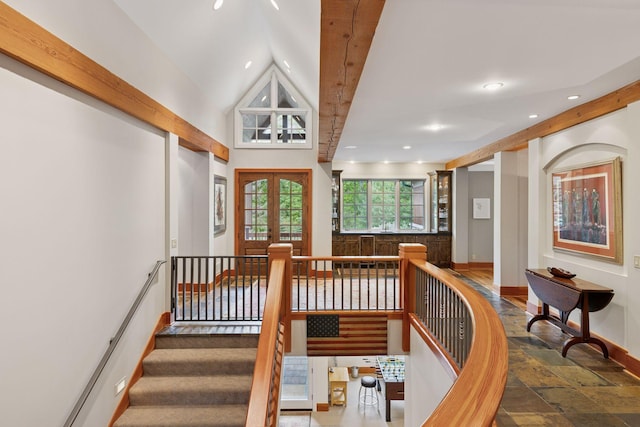 2442 Meeting St, Minnetonka, MN 55391 - staircase featuring baseboards, recessed lighting, lofted ceiling, stone tile flooring, and french doors