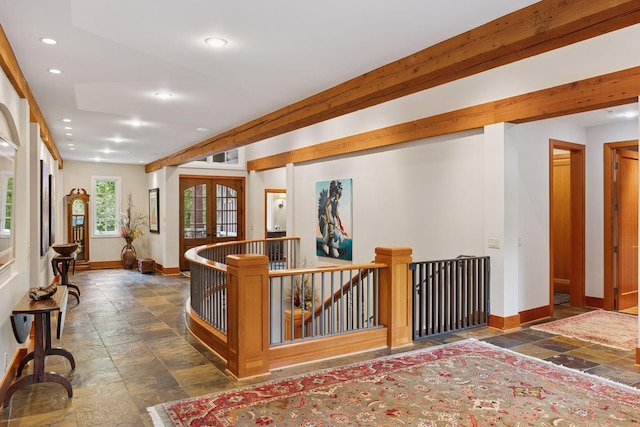 2442 Meeting St, Minnetonka, MN 55391 - hall with an upstairs landing, baseboards, stone tile floors, and recessed lighting