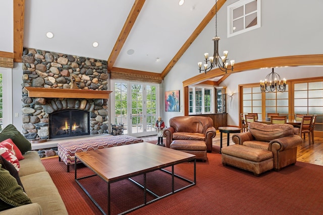 2442 Meeting St, Minnetonka, MN 55391 - living area with a chandelier, beam ceiling, wood finished floors, high vaulted ceiling, and a stone fireplace