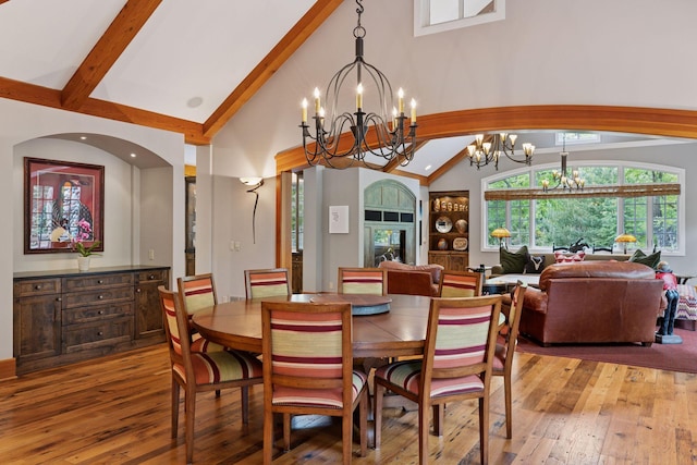 2442 Meeting St, Minnetonka, MN 55391 - dining room with a chandelier, high vaulted ceiling, light wood-style flooring, and beamed ceiling