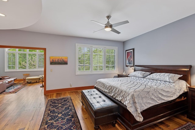 2442 Meeting St, Minnetonka, MN 55391 - bedroom with multiple windows, baseboards, hardwood / wood-style floors, recessed lighting, and a ceiling fan