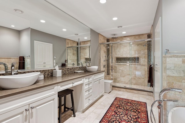 2442 Meeting St, Minnetonka, MN 55391 - bathroom with a stall shower, double vanity, and recessed lighting