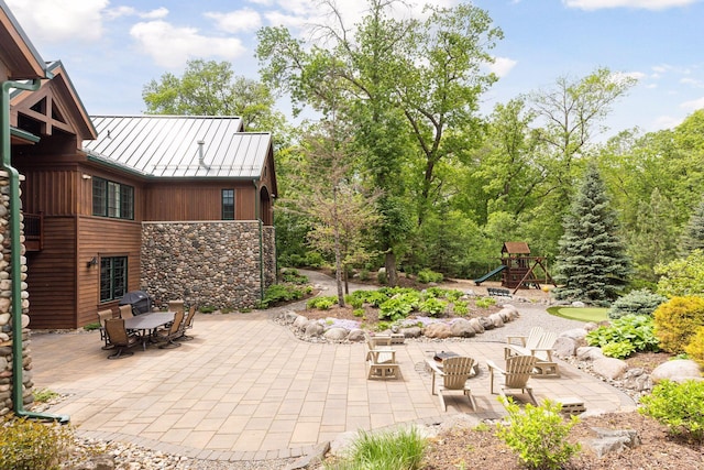 2442 Meeting St, Minnetonka, MN 55391 - view of patio / terrace with a playground