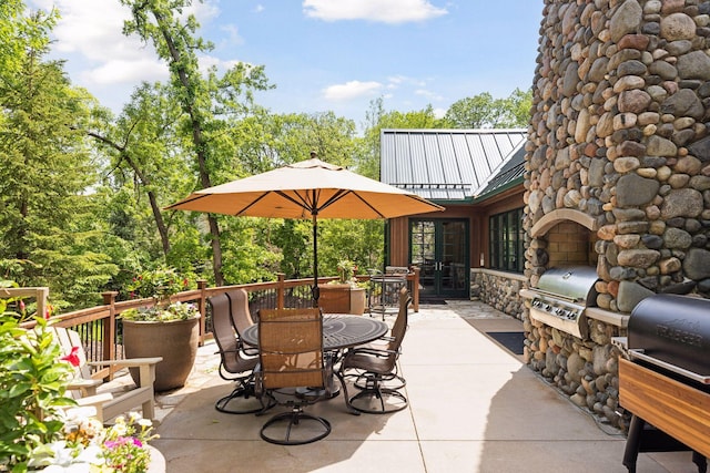 2442 Meeting St, Minnetonka, MN 55391 - view of patio featuring outdoor dining space and french doors