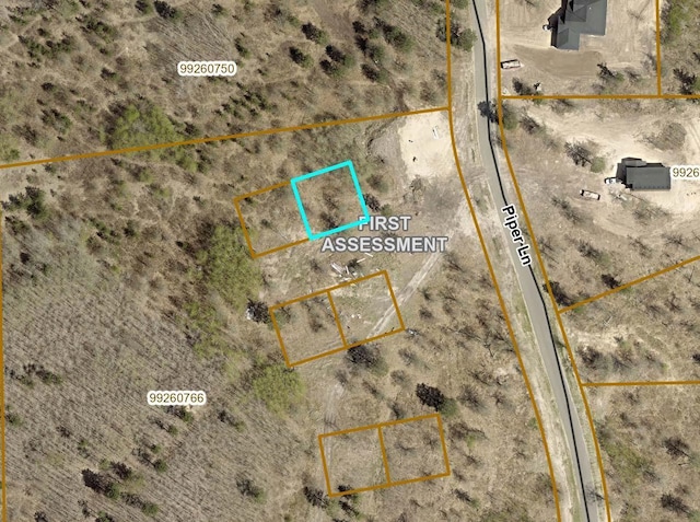 aerial view of property's location featuring property parcel outlined