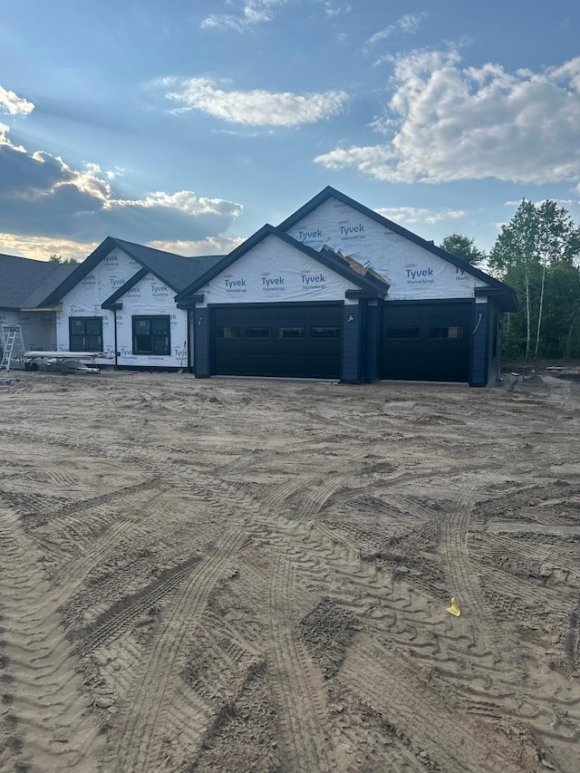 view of front of property featuring a garage