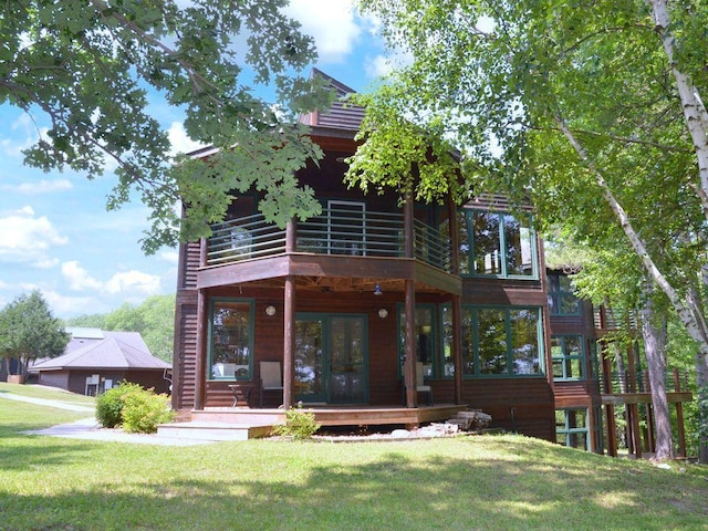 27620 Island View Dr, Park Rapids, MN 56470 - rear view of house featuring a yard, a balcony, french doors, and a deck