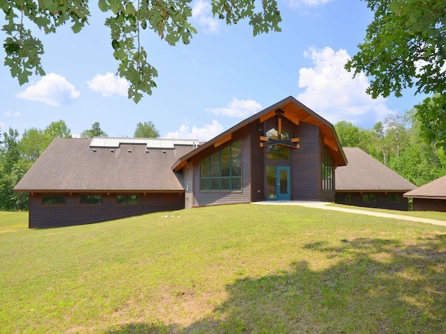 27620 Island View Dr, Park Rapids, MN 56470 - rear view of property featuring a lawn, french doors, and a shingled roof