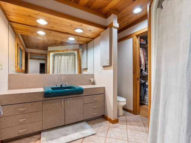 27620 Island View Dr, Park Rapids, MN 56470 - full bathroom with wooden ceiling, recessed lighting, vanity, toilet, and a spacious closet