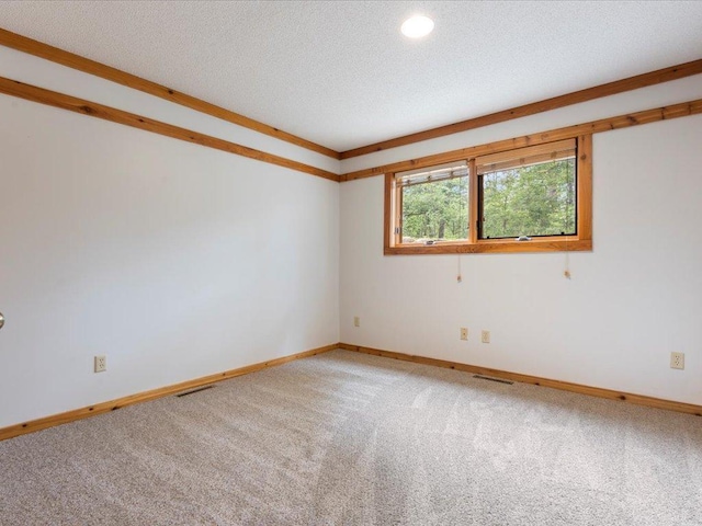 27620 Island View Dr, Park Rapids, MN 56470 - spare room featuring light colored carpet, baseboards, recessed lighting, and a textured ceiling