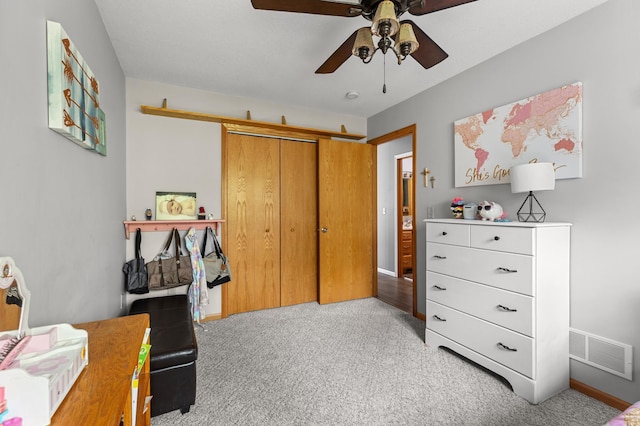 14465 Blackberry Ct, Baxter, MN 56425 - carpeted bedroom with a closet, baseboards, and a ceiling fan