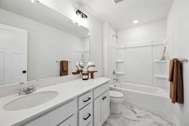 6570 Jody Ave S, Cottage Grove, MN 55016 - bathroom featuring marble look tile flooring, washtub / shower combination, vanity, toilet, and recessed lighting