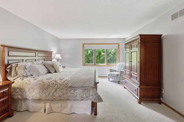 4650 Cottonwood Ln N, Plymouth, MN 55442 - bedroom with light carpet and a textured ceiling