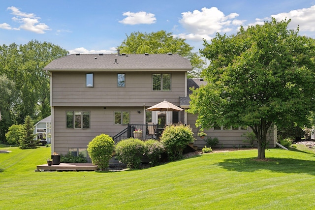 4650 Cottonwood Ln N, Plymouth, MN 55442 - rear view of house with a wooden deck, a yard, and a shingled roof