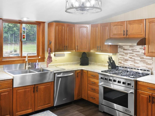 601 Kingsway Dr, Le Sueur, MN 56058 - kitchen featuring stainless steel appliances, extractor fan, a sink, light countertops, and backsplash