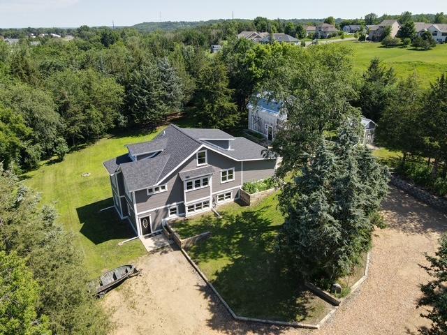 601 Kingsway Dr, Le Sueur, MN 56058 - view of subject property featuring a forest
