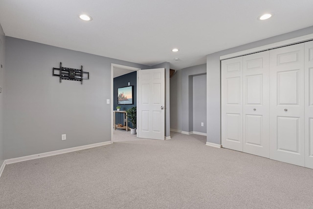 2019 Utah Ave S, Saint Louis Park, MN 55426 - unfurnished bedroom featuring light colored carpet, recessed lighting, baseboards, and a closet