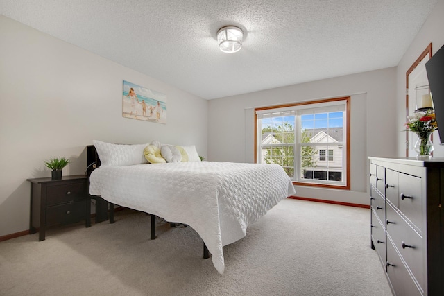 5133 Farnham Dr N, Hugo, MN 55038 - bedroom with light carpet, baseboards, and a textured ceiling